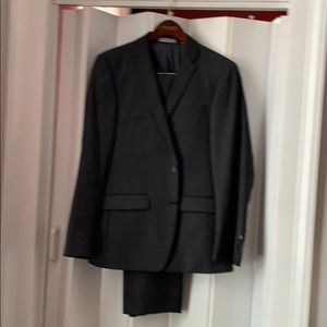 DKNY 2-piece suit. New. Size 40R.